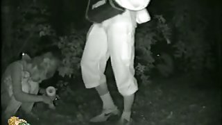 Candid night video of a skinny girl peeing in the bushes