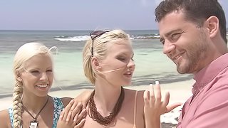 Tarra and Boroka Bolls want to share a cock during a beach threesome
