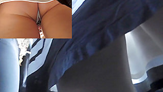 Young brunette appears in the fresh upskirt public clip