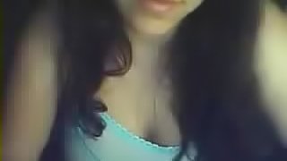 Homemade video of the brunette babe and her giant boobs