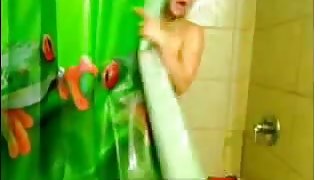 Hot sexual blonde puts on shower show
