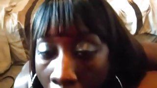 Ebony girl gives her bf a teasing blowjob