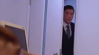 Attractive Japanese dame giving superb blowjob in the office in close up shoot
