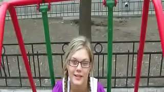 Blonde chick with glasses sucks on a hard cock outside