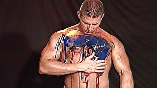 Junkyard Boy Dillon Day Paints His Muscular Body