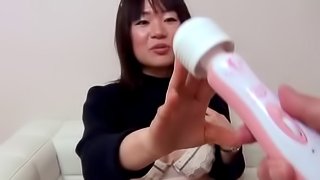 Japanese model fondles her lovely tits while rubbing a high voltage vibrator between her legs!