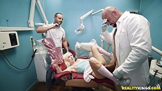 Blonde slut Vera Bliss fondles shaved pussy and blowjobs doctor's big dick