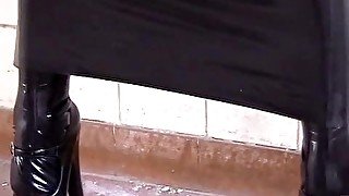 Black Latex Rubber Church Nun With High Heels Pisses Outdoor And Peeing In Pee Bag