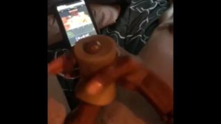 Scooby playing with the pocket pussy while watching porn