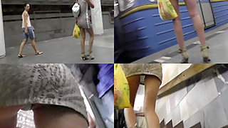 Upskirting thong footage of a brunette in mini skirt