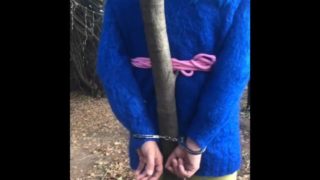Sweater Sissy in the outdoors handcuff to a tree  part 1