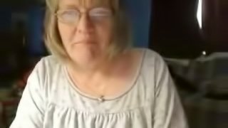 Chubby granny shows her big natural tits and shaved vag for the webcam