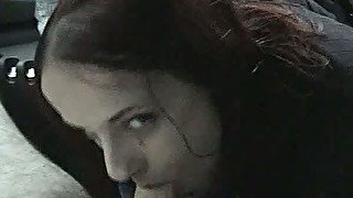Cute redhead prostitute gives head on cam in the car