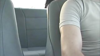 Busty hotty gives head in the car