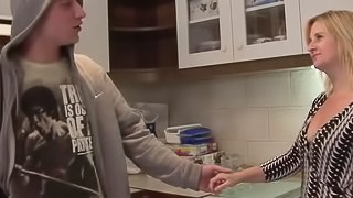 Tight black and white get-up housewife fucks a young dude