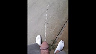 Pissing outsude in a summer shower