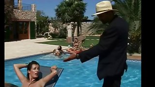 Relentless master torments his slave by the pool