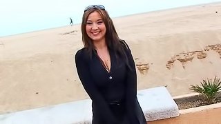 Busty Asian Babe Shows Off her Big Knockers Outdoors