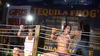 Drunk girls get topless during a wet t-shirt contest