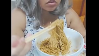 Cute feedee eats noodles for her feeder