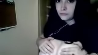 Young girl plays with huge tits