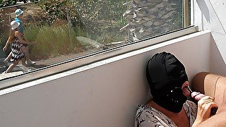 Public Blowjob on Sunny Balcony makes him cum fast, while strangers walking by during his cumshot