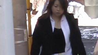 Busty Japanese lady grabbed from behind by a street sharker
