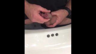 Watch my Flaccid uncut cock taking a piss in the sink @ work. Then nearly busted a nut trying to Cum