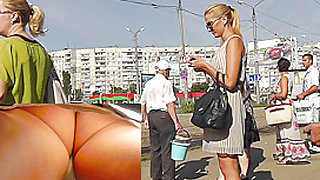 Stunning blonde filmed by spy upskirt camera in public