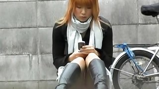 Stunning colorful admirable chick messing with her phone during sharking scene