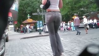 Awesome hussy in black jeans has a very big athletic butt